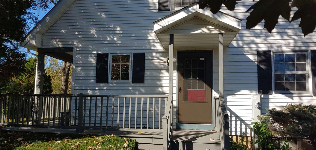 20979 Free Church Road Caledonia, IL 61011 - Photo 6 of 40 a front view of a house with a garden