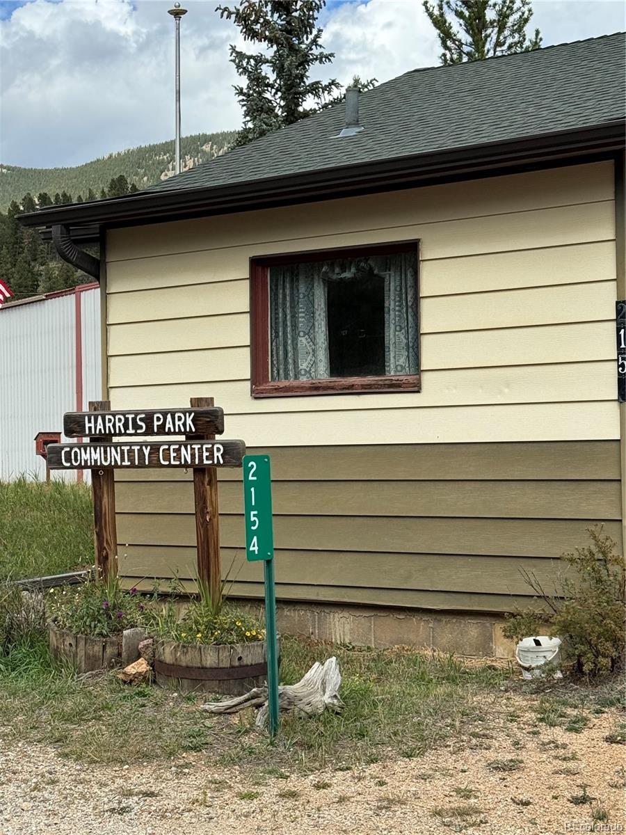 414 Hall Road Bailey, CO 80421 - Photo 3 of 19 a view of a house with a yard