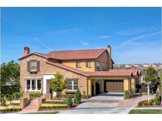 2461 Lapis Road Carlsbad, CA 92009 - Photo 2 of 25 This Tuscan stone-wrapped home is situated on an elevated and deep lot with no neighbors behind. Long driveway can accommodate all your guest parking and features an architectural Porte-Cochere.