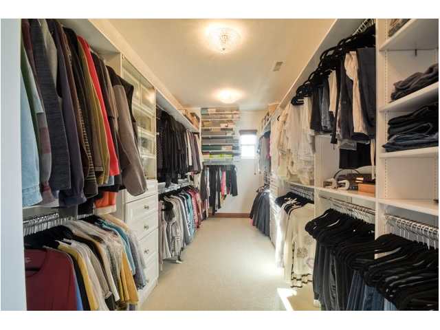 2461 Lapis Road Carlsbad, CA 92009 - Photo 16 of 25 The final touch to perfect master is a large, well organized walk in closet. Great lighting and custom shelving.