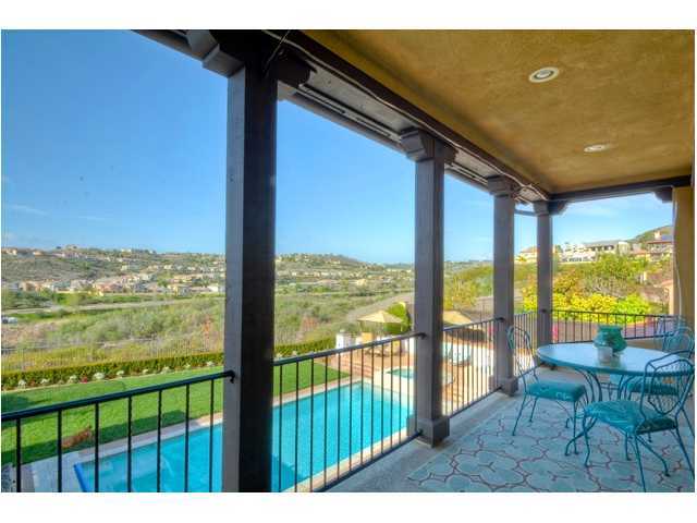 2461 Lapis Road Carlsbad, CA 92009 - Photo 18 of 25 A large, private view balcony off the master suite offers sweeping views out over the yard and natural preserve