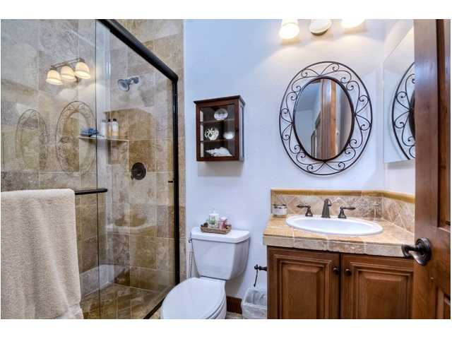 2461 Lapis Road Carlsbad, CA 92009 - Photo 21 of 25 The downstairs bedroom has a tastefully appointed private bathroom and shower.