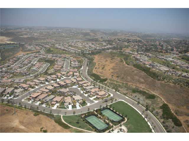 2461 Lapis Road Carlsbad, CA 92009 - Photo 24 of 25 Walkable from this home is the La Costa Greens TENNIS courts, large grassy PARK and PLAYGROUND. This a great gathering spot for neighbors, birthday parties, baby stroller workouts, and HOA hosted events (Summer movie night, Spring brunch etc).