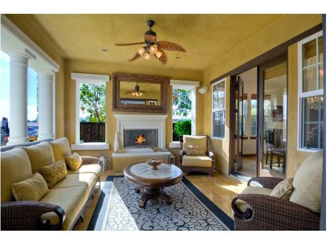2461 Lapis Road Carlsbad, CA 92009 - Photo 6 of 25 This "California Room" is open to the outside and accessed off the front entry and is flanked by two sets of glass French doorways. This area is NOT included in the 4316 square footage. With this area the home lives like a 4500 sq foot home.