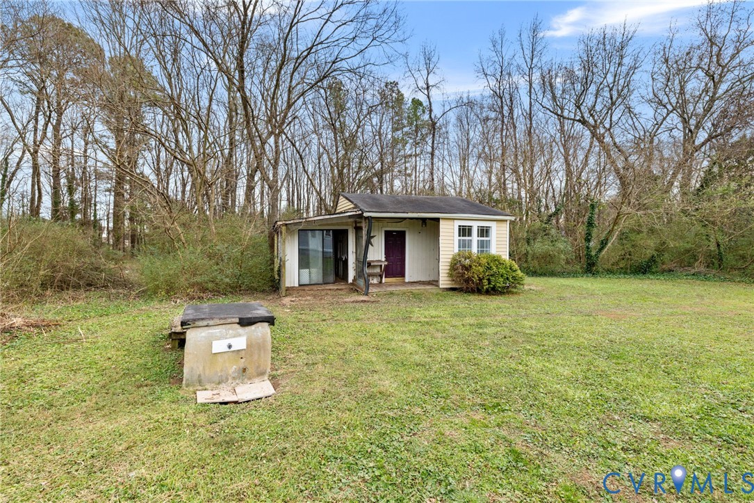 1340 New Market Road Henrico, VA 23231 - Photo 21 of 26 Detached, rear shed. Loads of possibilities! Gar
