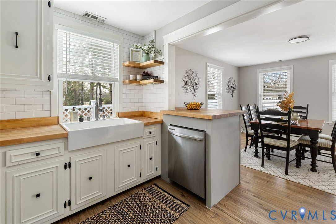 1340 New Market Road Henrico, VA 23231 - Photo 8 of 26 Updated kitchen with butcher block counters and fl