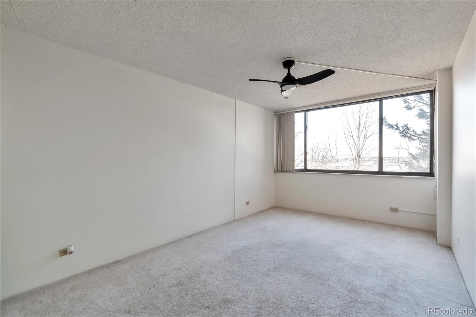 1850 Folsom Street, Unit 411 Boulder, CO 80302 - Photo 14 of 28 a view of an empty room with a window