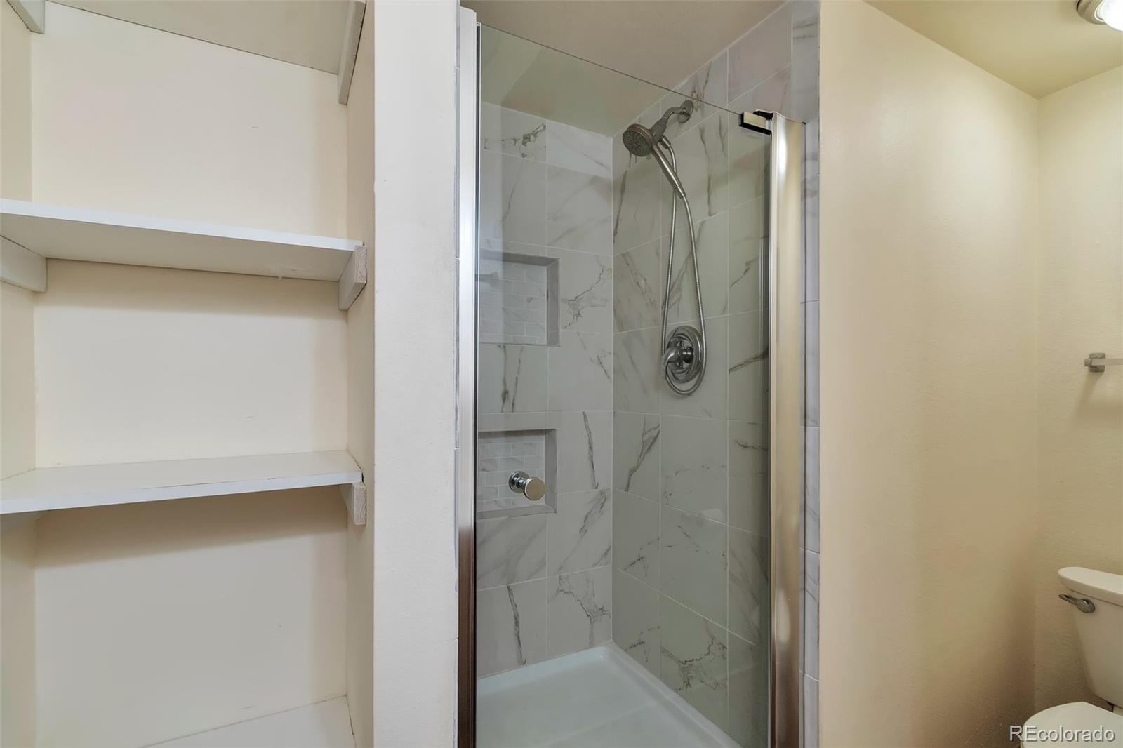 1850 Folsom Street, Unit 411 Boulder, CO 80302 - Photo 10 of 28 a bathroom with a shower