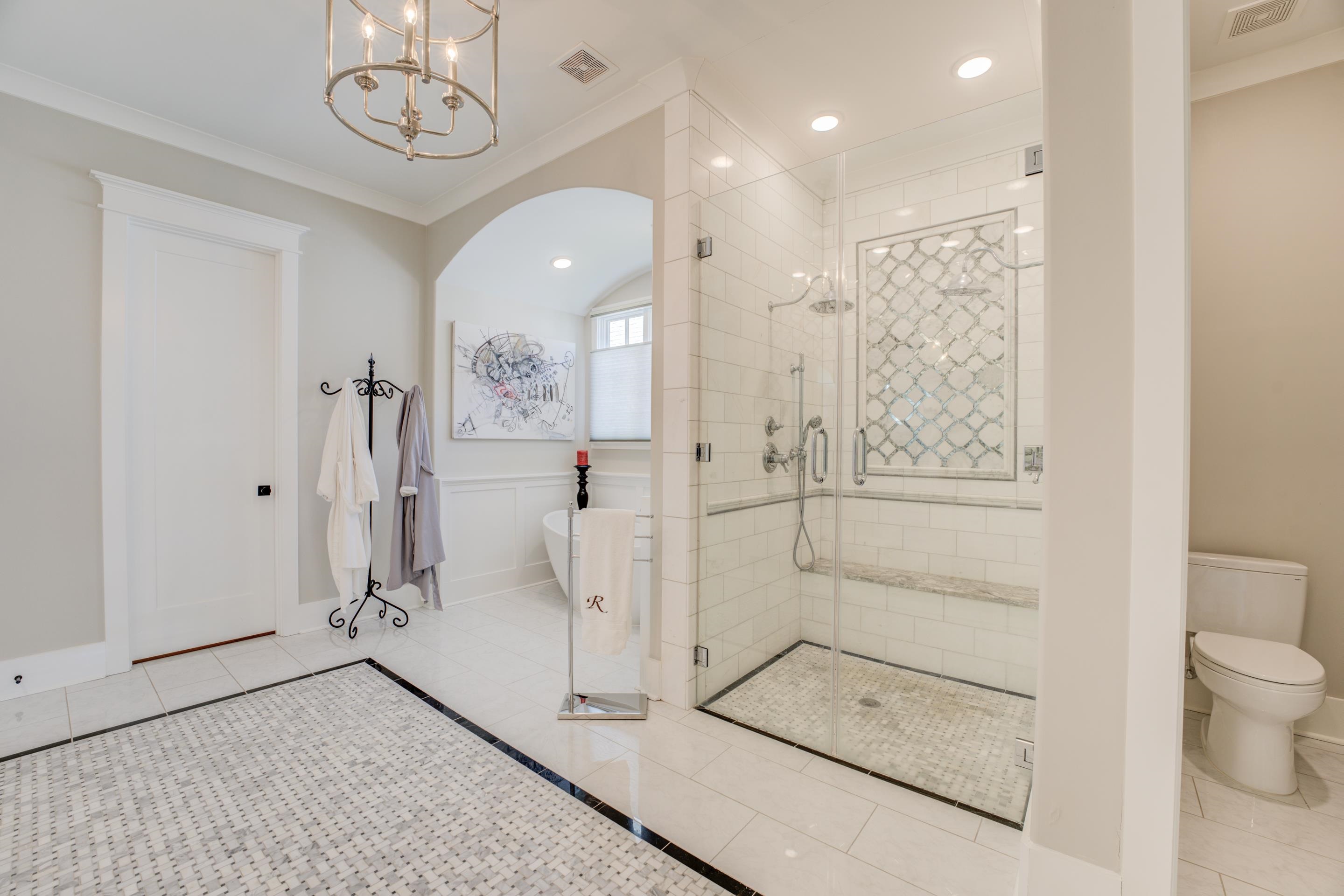 112 North Mt Pleasant Road Collierville, TN 38017 - Photo 20 of 40 a bathroom with a glass shower door and a sink