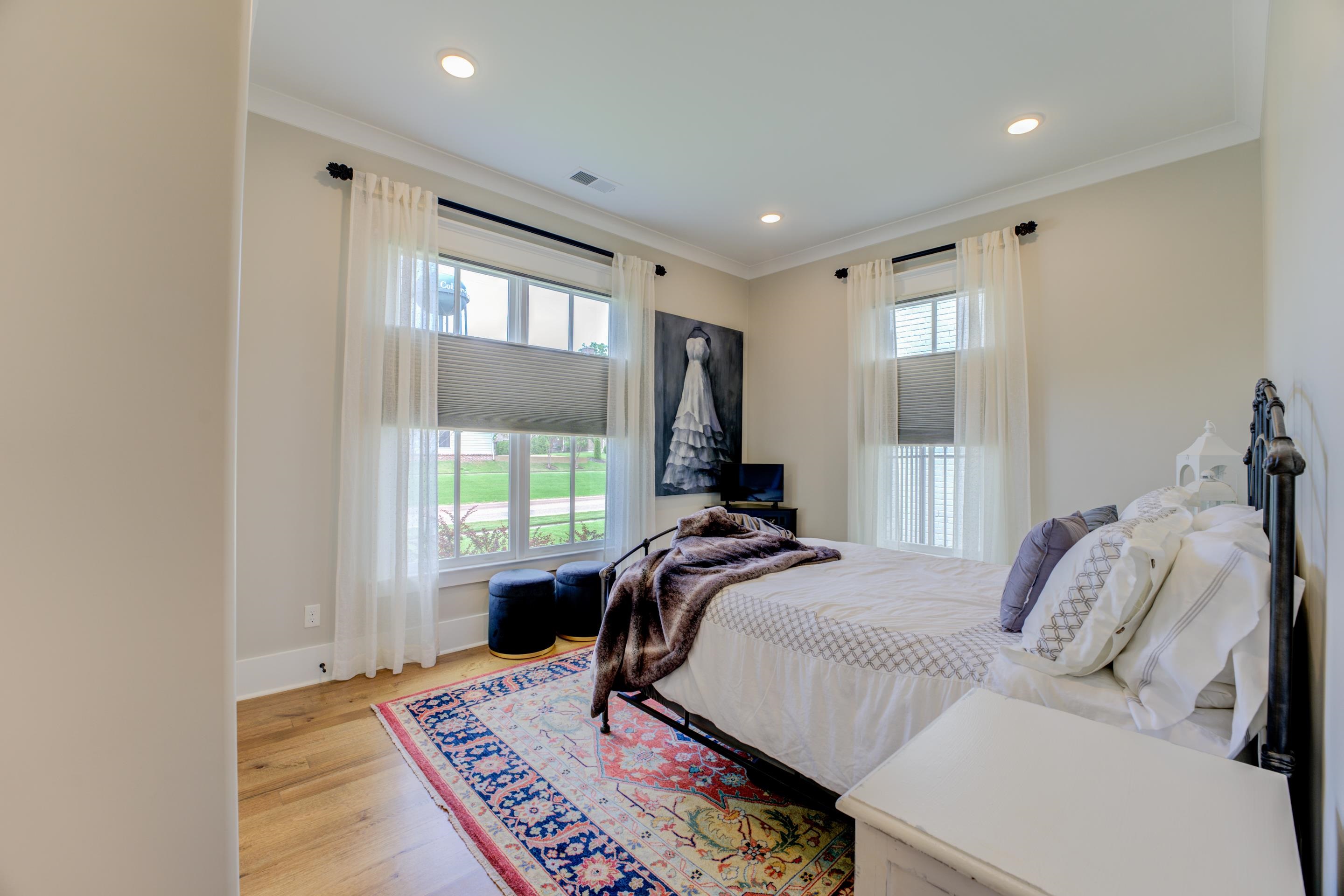 112 North Mt Pleasant Road Collierville, TN 38017 - Photo 24 of 40 a bed sitting in a spacious bedroom next to a window