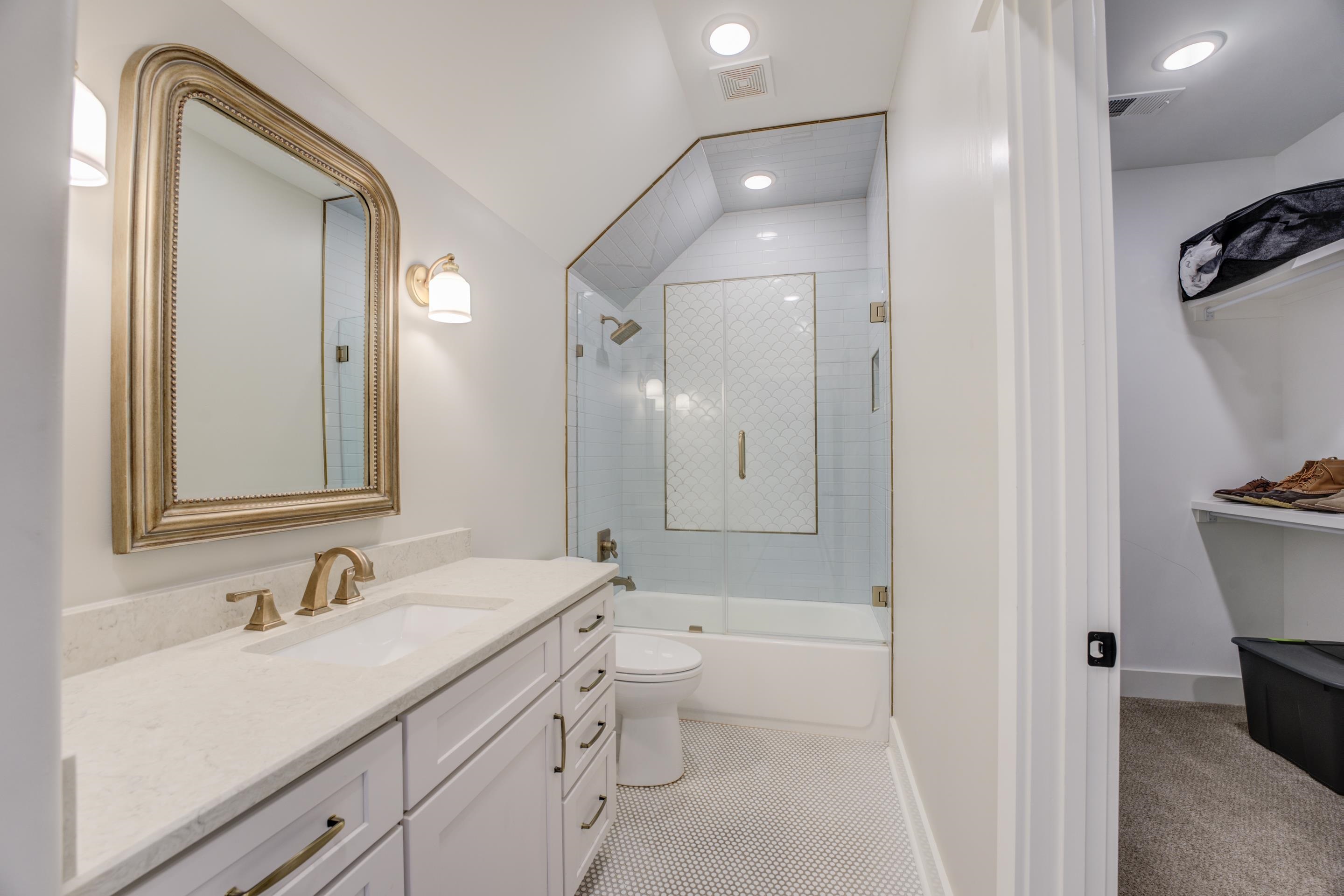 112 North Mt Pleasant Road Collierville, TN 38017 - Photo 31 of 40 a bathroom with a sink a toilet and a mirror
