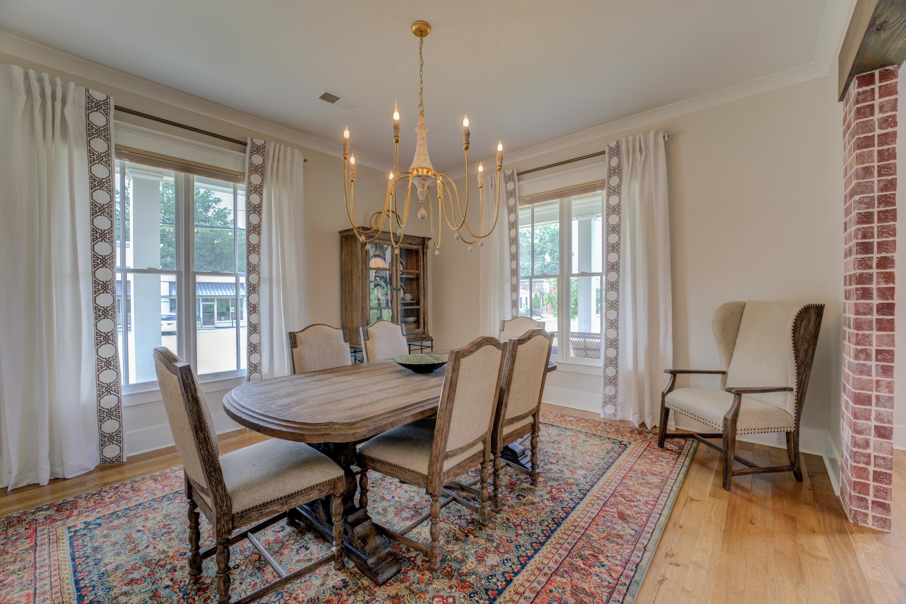 112 North Mt Pleasant Road Collierville, TN 38017 - Photo 7 of 40 a view of a dining room with furniture window and wooden floor