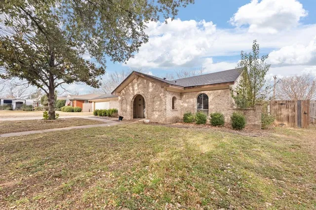 a view of house with outdoor space and street view