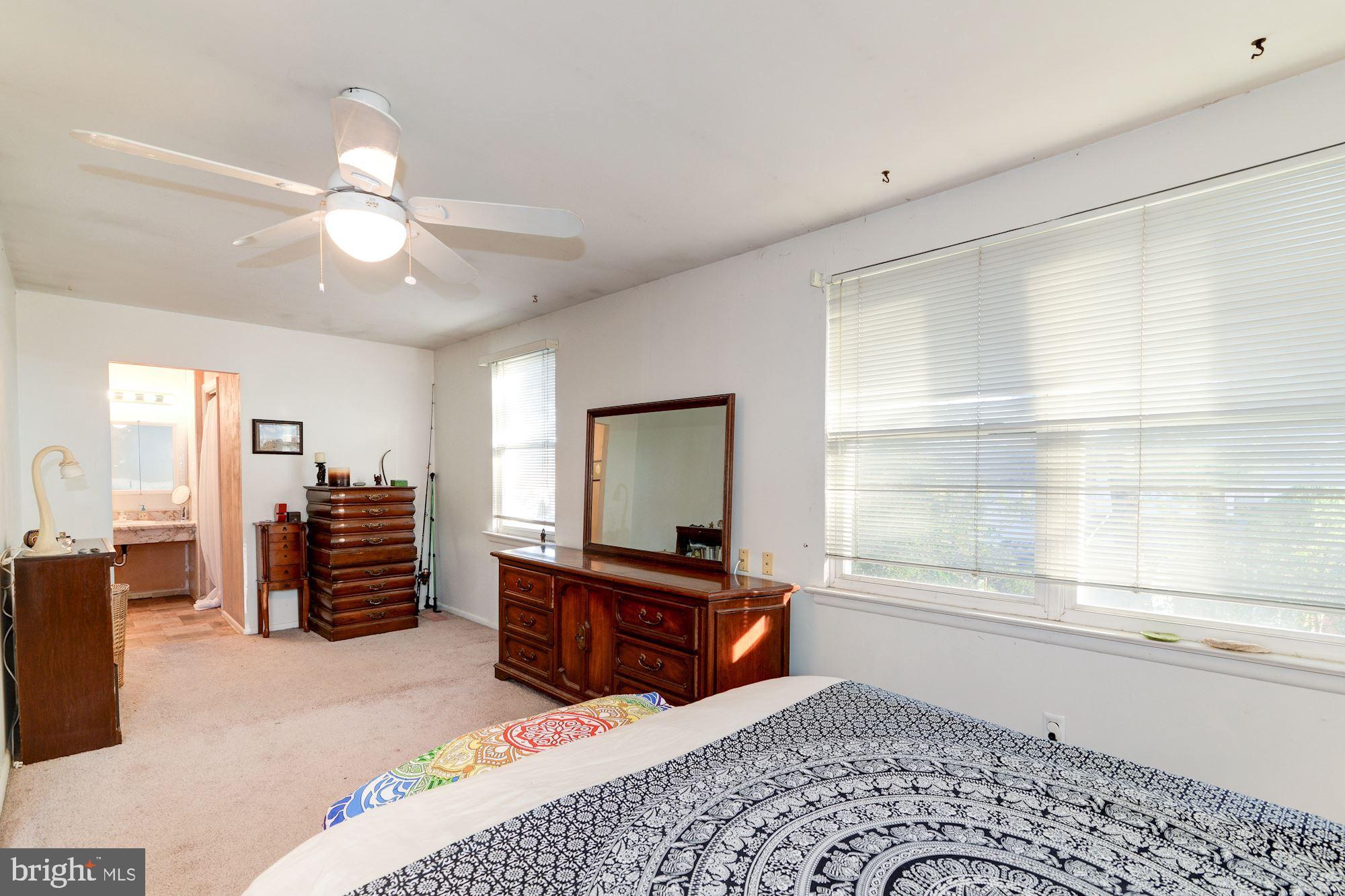 1604 Coventry Place Clementon, NJ 08021 - Photo 29 of 45 a bedroom with furniture and a large window