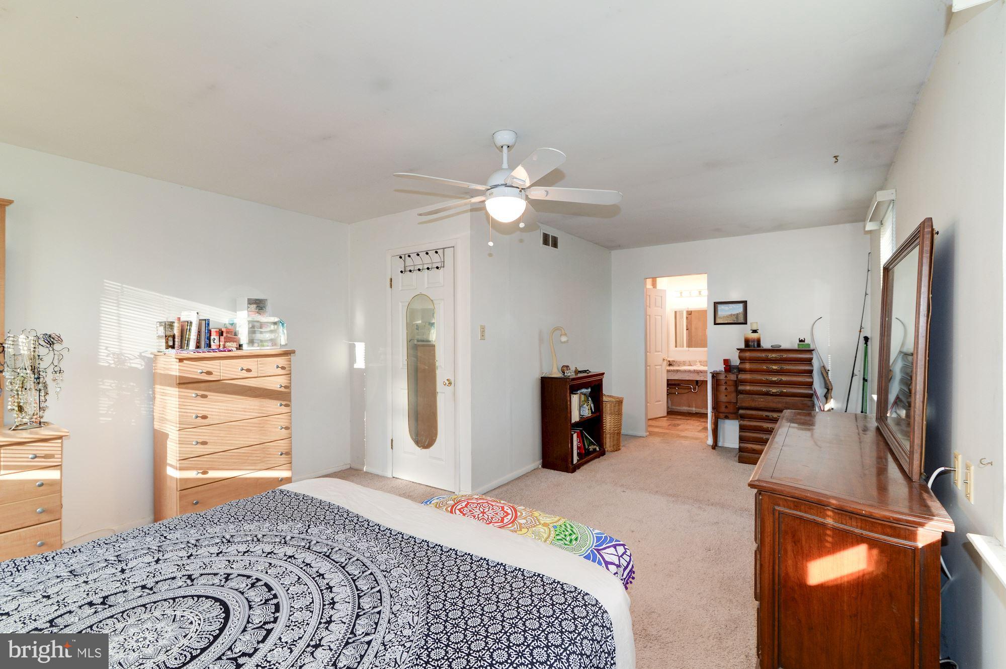 1604 Coventry Place Clementon, NJ 08021 - Photo 30 of 45 a bedroom with a bed dresser and a window