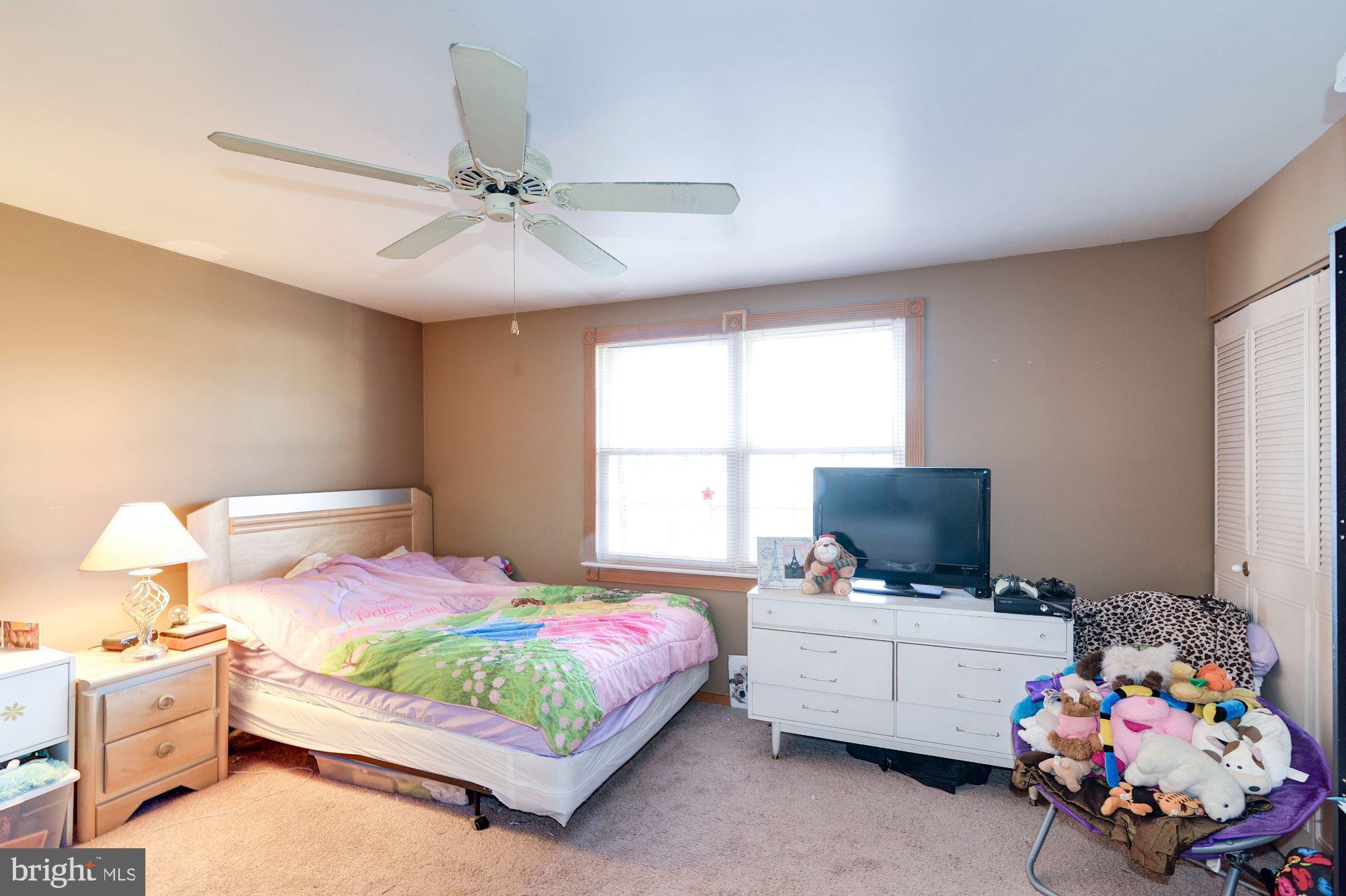 1604 Coventry Place Clementon, NJ 08021 - Photo 34 of 45 a bedroom with a bed and flat screen tv