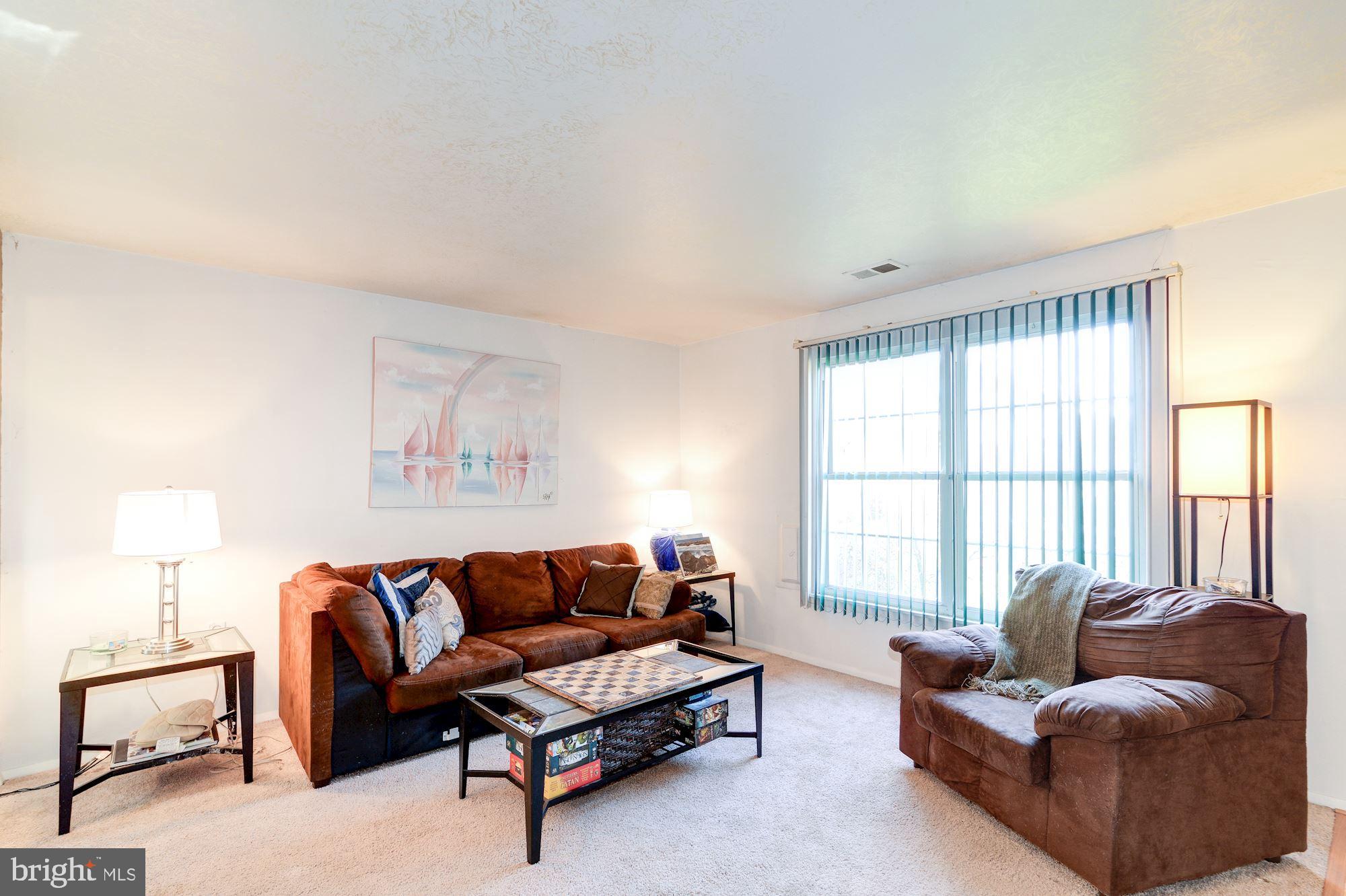 1604 Coventry Place Clementon, NJ 08021 - Photo 8 of 45 a living room with furniture and a window
