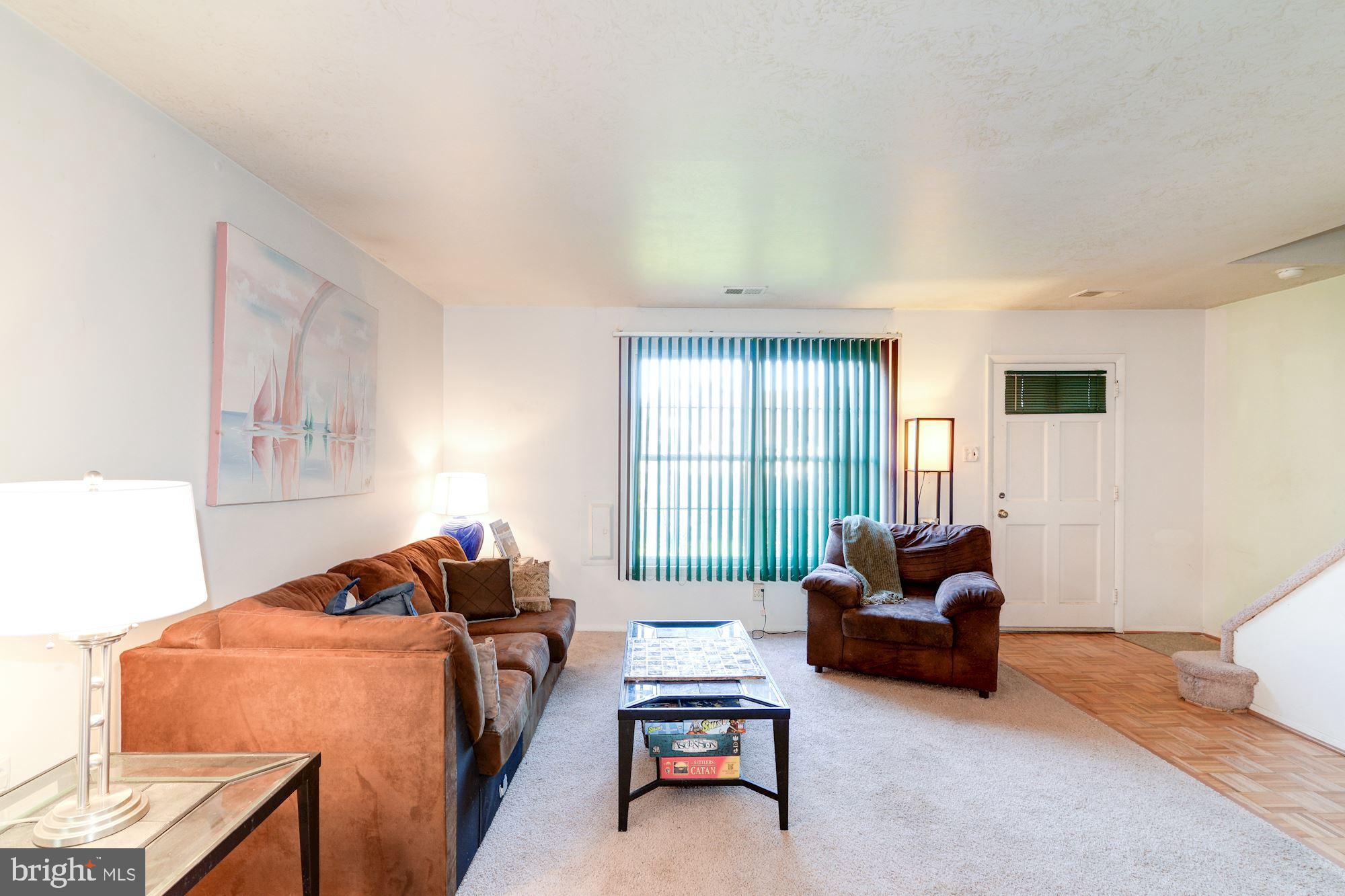 1604 Coventry Place Clementon, NJ 08021 - Photo 10 of 45 a living room with furniture and a large window