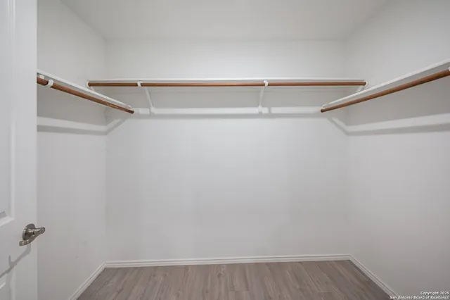 a view of an empty walk in closet