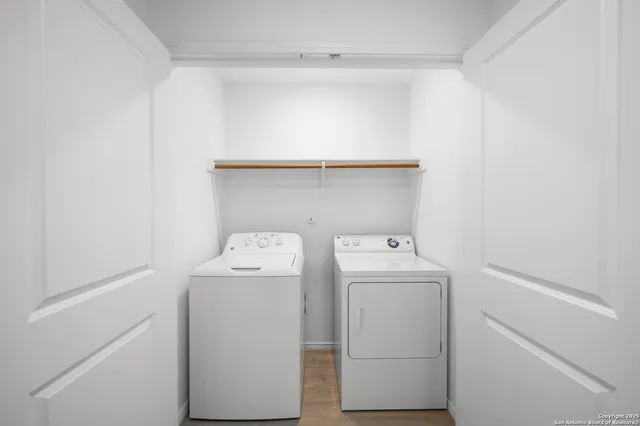 a utility room with dryer and washer