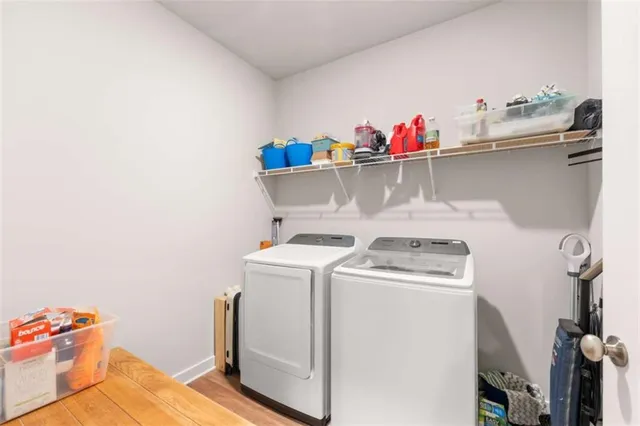 a utility room with dryer and washer