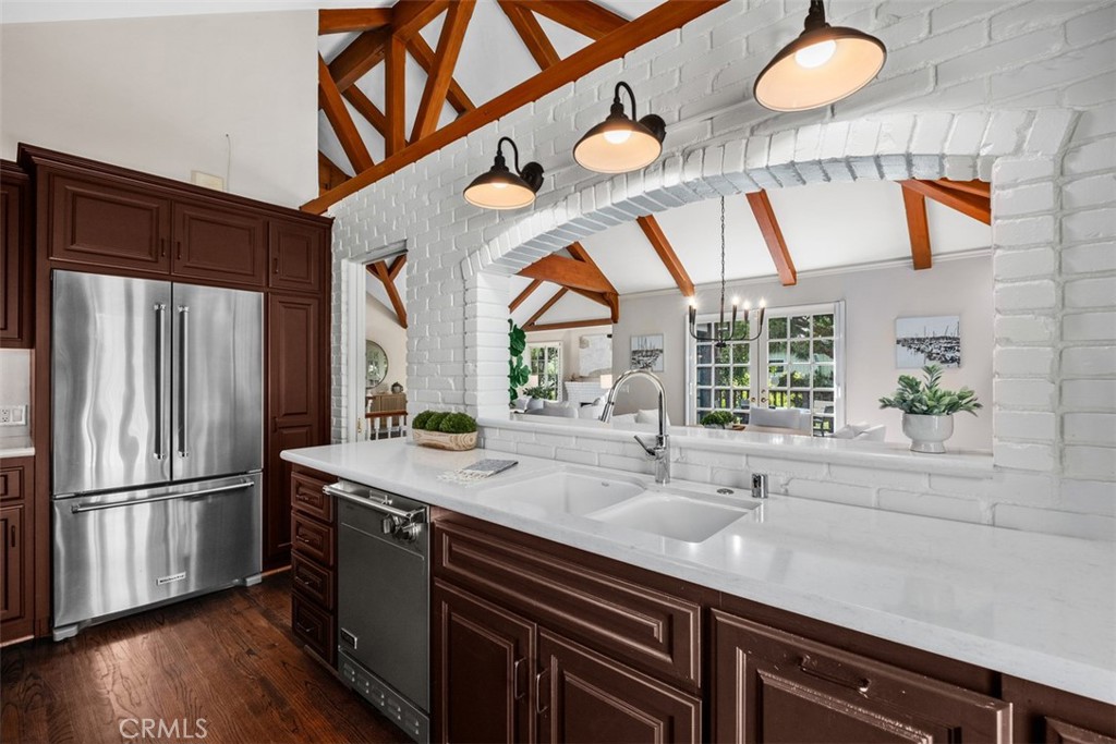 421 High Drive Laguna Beach, CA 92651 - Photo 11 of 42 a kitchen with stainless steel appliances granite countertop a sink a oven and a refrigerator