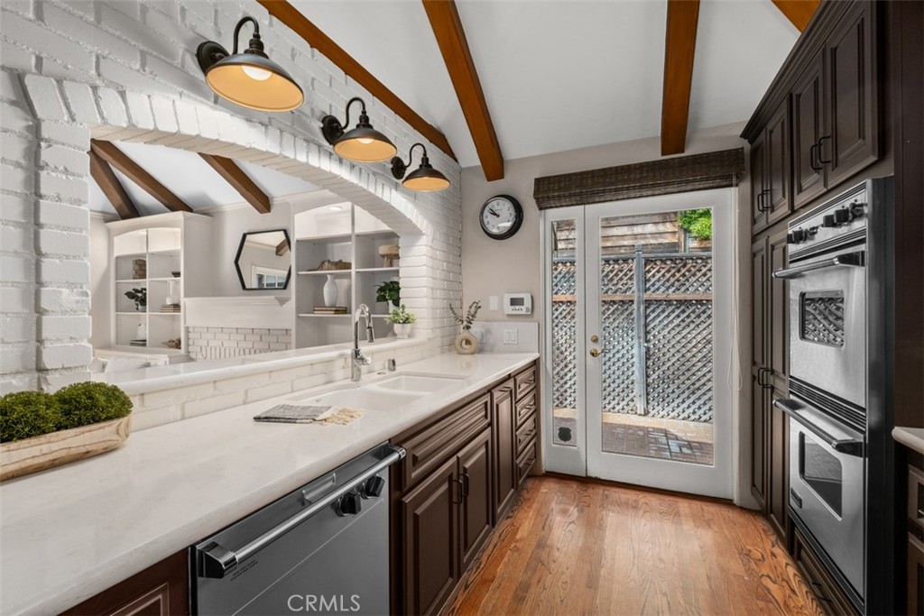 421 High Drive Laguna Beach, CA 92651 - Photo 13 of 42 a bathroom with a sink a mirror and a shower