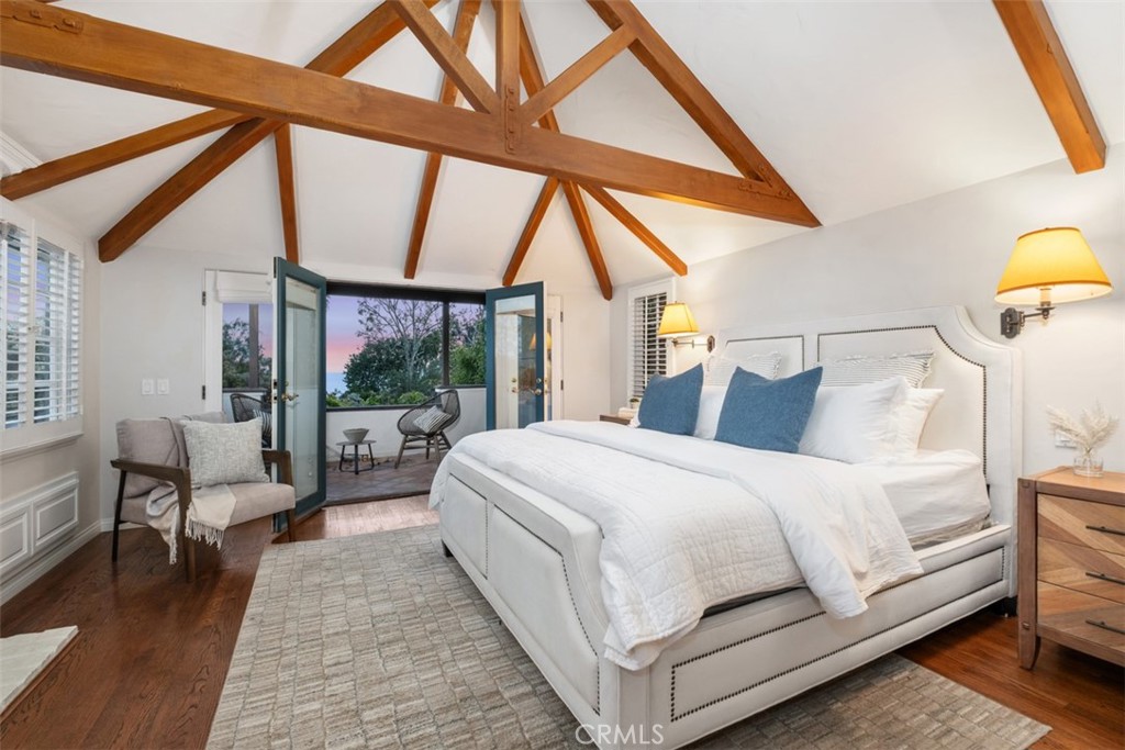 421 High Drive Laguna Beach, CA 92651 - Photo 20 of 42 a bedroom with a bed and a large window