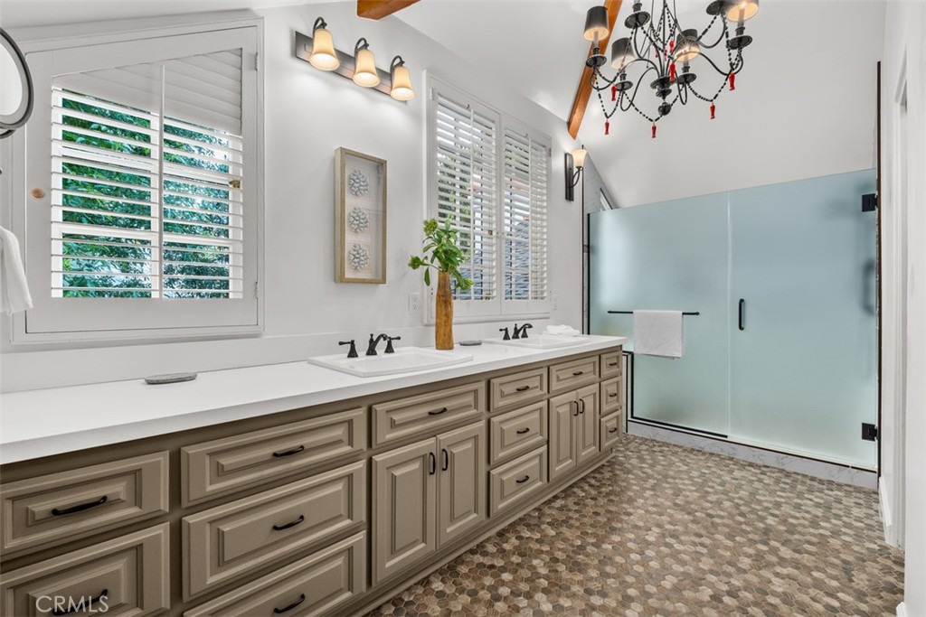 421 High Drive Laguna Beach, CA 92651 - Photo 26 of 42 a spacious bathroom with a sink a mirror and a shower