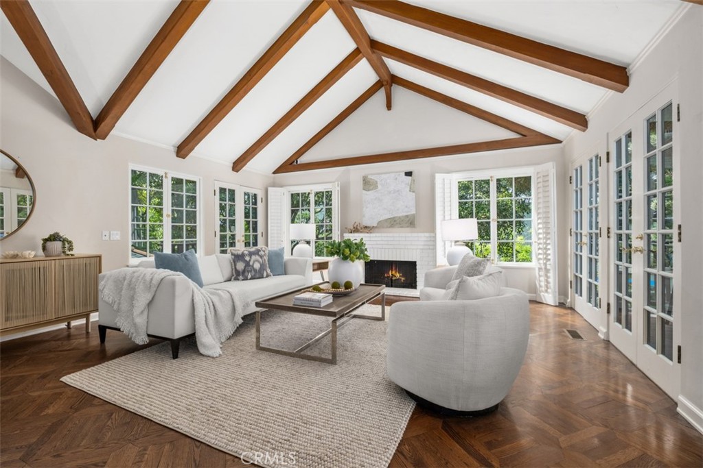 421 High Drive Laguna Beach, CA 92651 - Photo 6 of 42 a living room with furniture and a floor to ceiling window