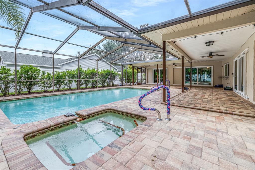 3404 Brian Road South Palm Harbor, FL 34685 - Photo 53 of 71 a view of a swimming pool with a patio