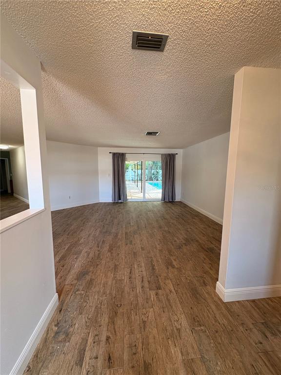3404 Brian Road South Palm Harbor, FL 34685 - Photo 71 of 71 a view of hallway with wooden floor and stairs