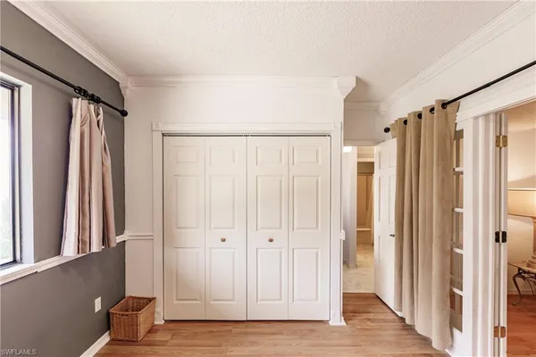 a view of entryway with wooden floor
