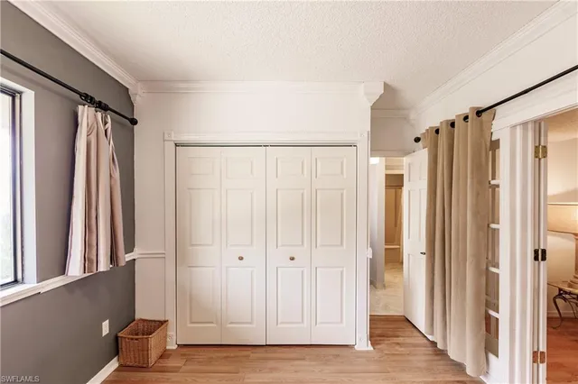 a view of entryway with wooden floor