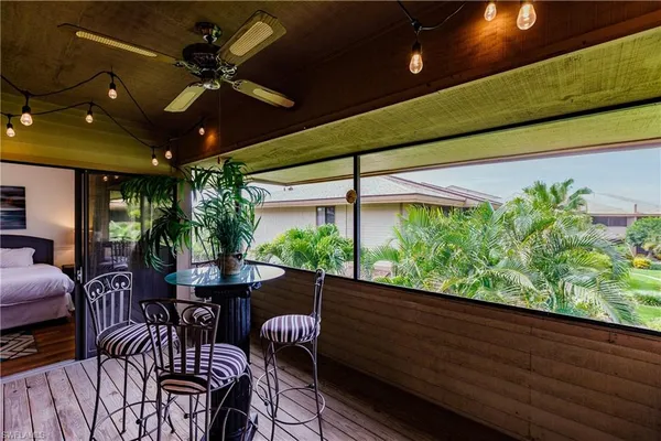 a outdoor living space with furniture and potted plants