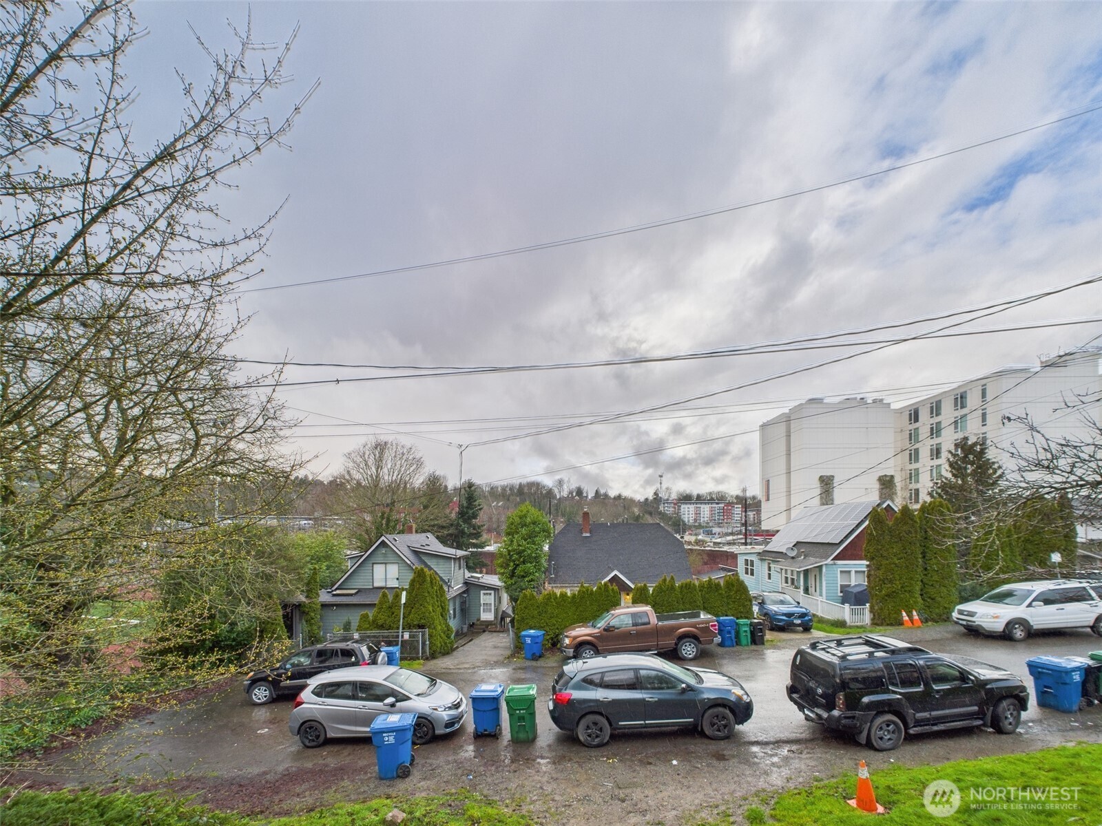 2820 29th Avenue South Seattle, WA 98144 - Photo 7 of 8 a view of a cars park in front of house