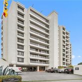 a front view of a building with street view