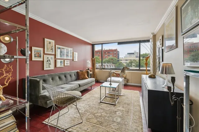 a living room with furniture and a couch