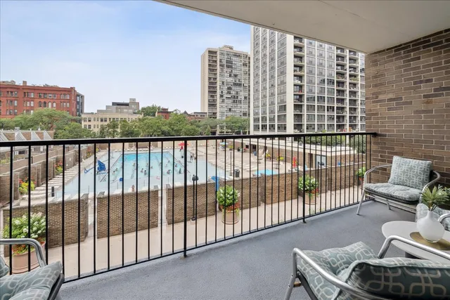 an aerial view of a house with outdoor space