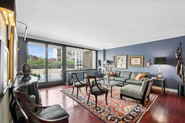 a living room with furniture and a table