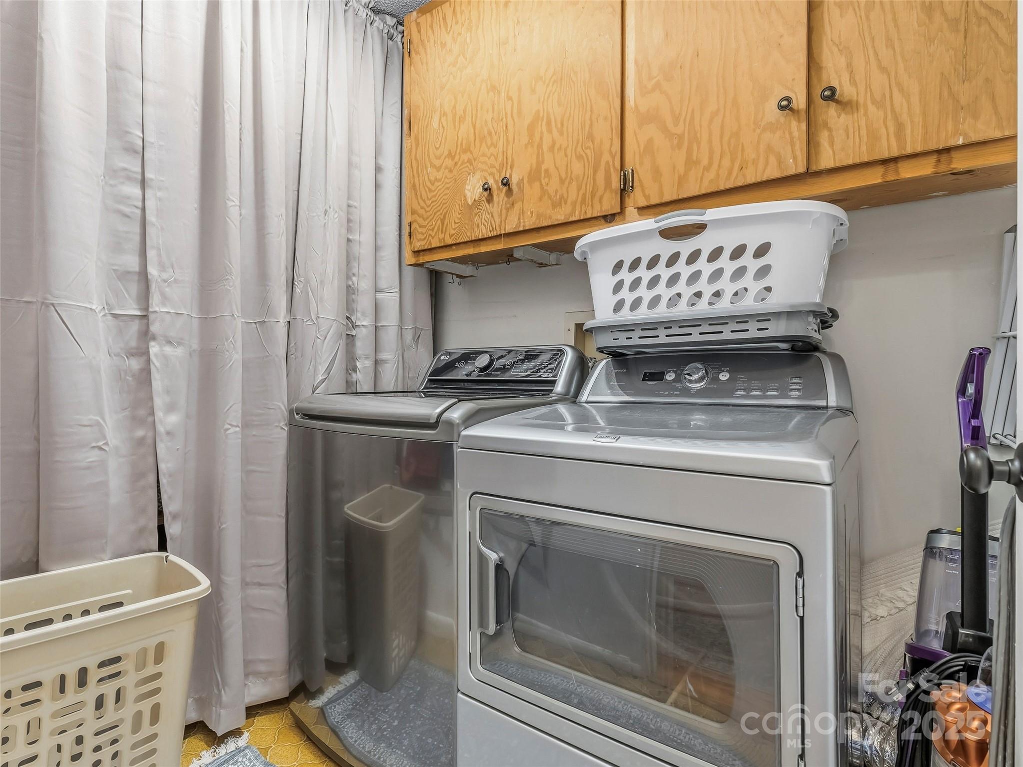 531 Three Mile Knob Road Pisgah Forest, NC 28768 - Photo 27 of 37 a bathroom with a sink a toilet and a window