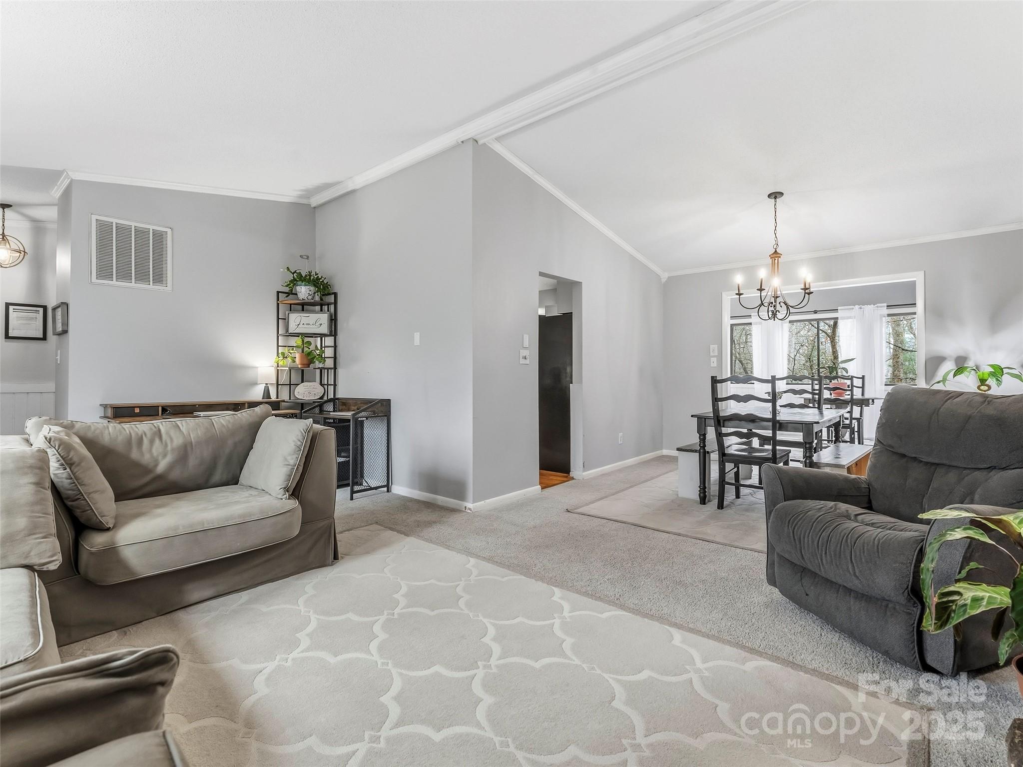 531 Three Mile Knob Road Pisgah Forest, NC 28768 - Photo 6 of 37 a living room with furniture and wooden floor