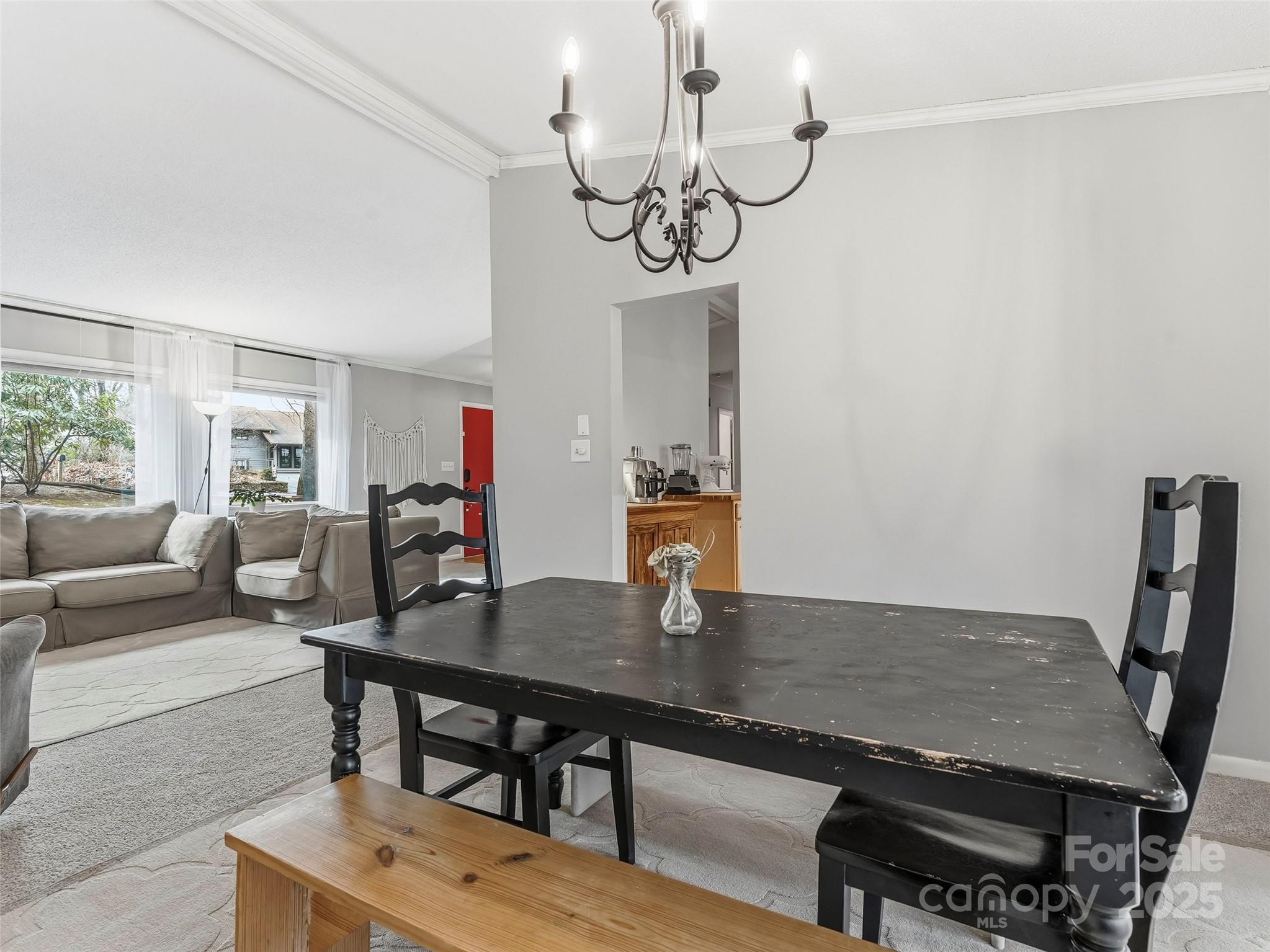 531 Three Mile Knob Road Pisgah Forest, NC 28768 - Photo 10 of 37 a view of a dining room with furniture