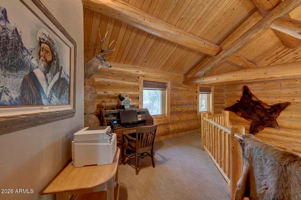 a view of a chairs and a table in a patio
