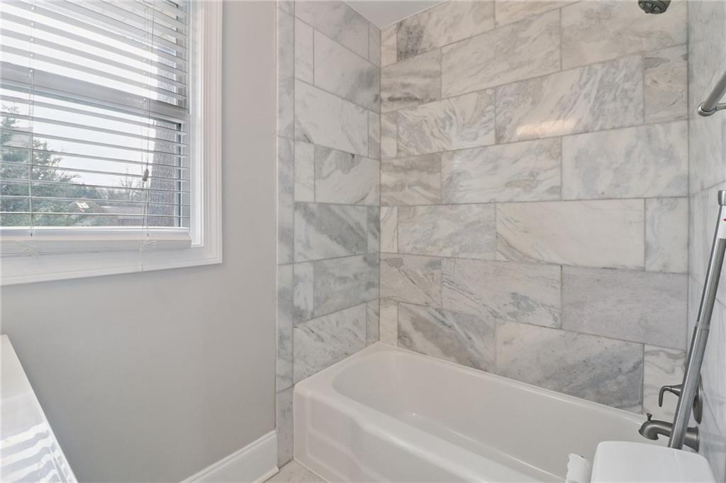 2477 North Decatur Road, Unit B4 Decatur, GA 30033 - Photo 16 of 25 a bathroom with a bathtub
