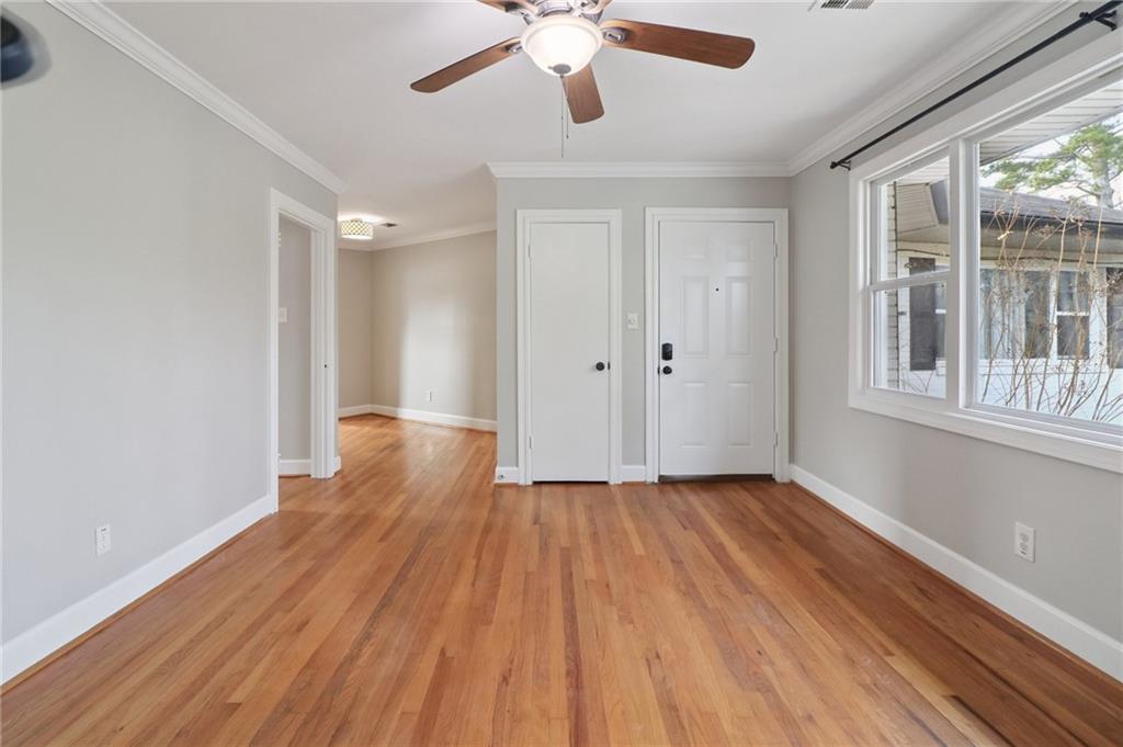2477 North Decatur Road, Unit B4 Decatur, GA 30033 - Photo 18 of 25 a view of an empty room with wooden floor and a window