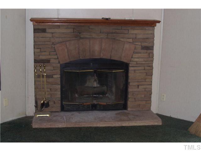 44 Barnes Road Middlesex, NC 27557 - Photo 3 of 5 Fireplace in family room