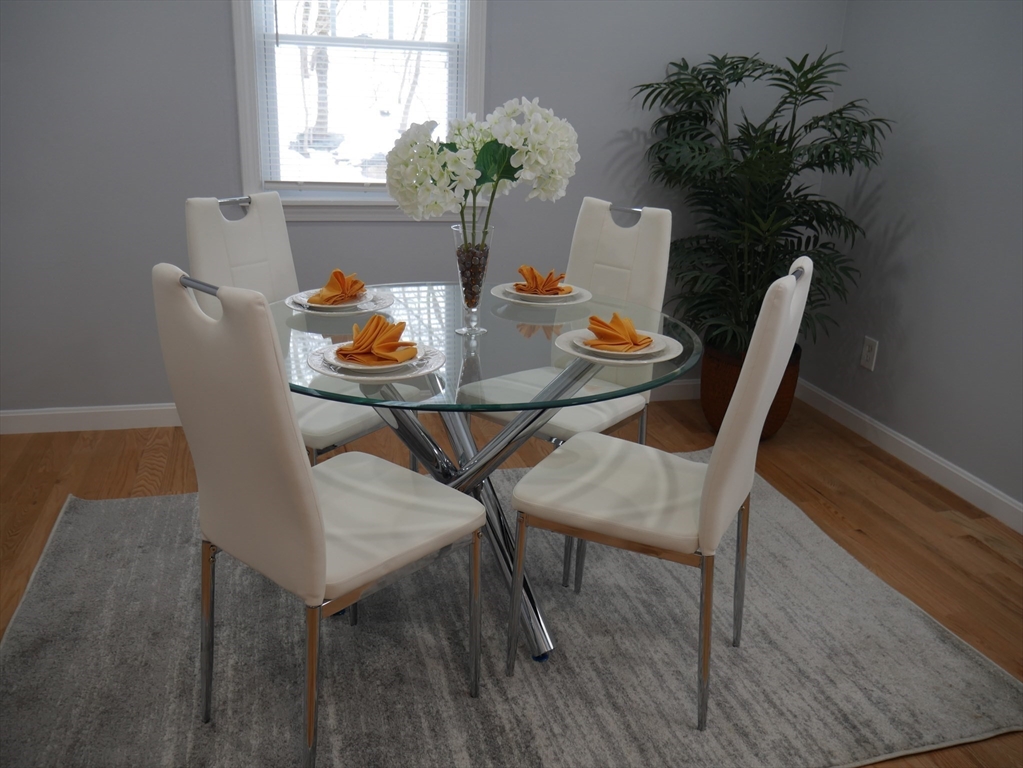 54 Harris Road Lynn, MA 01904 - Photo 15 of 41 a view of a dining room with furniture and window