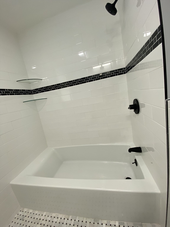 54 Harris Road Lynn, MA 01904 - Photo 19 of 41 a bathroom with a bathtub and a shower