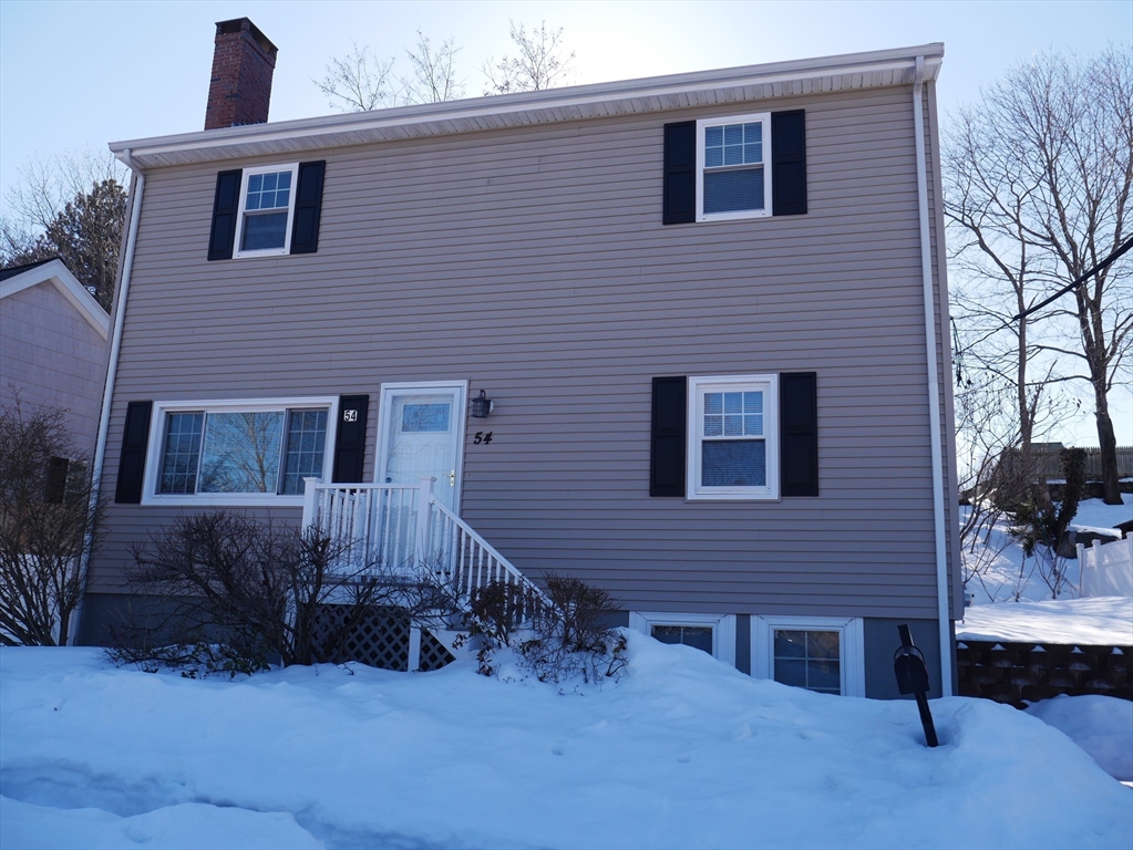 54 Harris Road Lynn, MA 01904 - Photo 40 of 41 a front view of a house with a yard